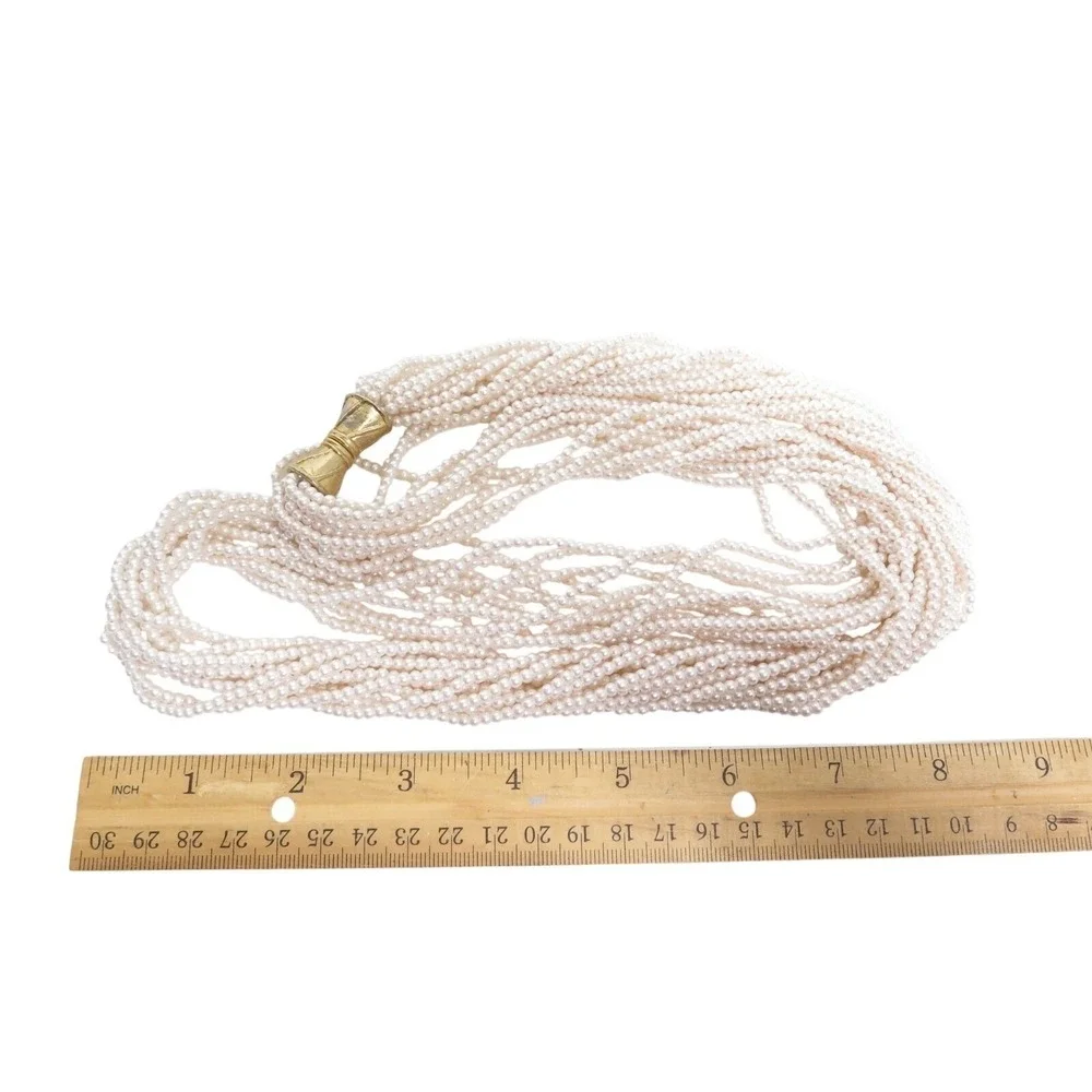 VINTAGE 12 STRAND‎ TWISTED SMALL CREAM GLASS FAUX PEARL BEADS 34